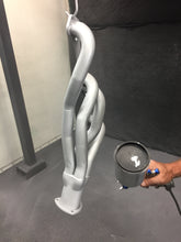 Load image into Gallery viewer, Zybar cast small block header sprayed with the ZyCoat product showing a gray aluminum finish